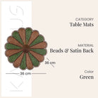 Handcrafted starry beaded placemat in green and white
