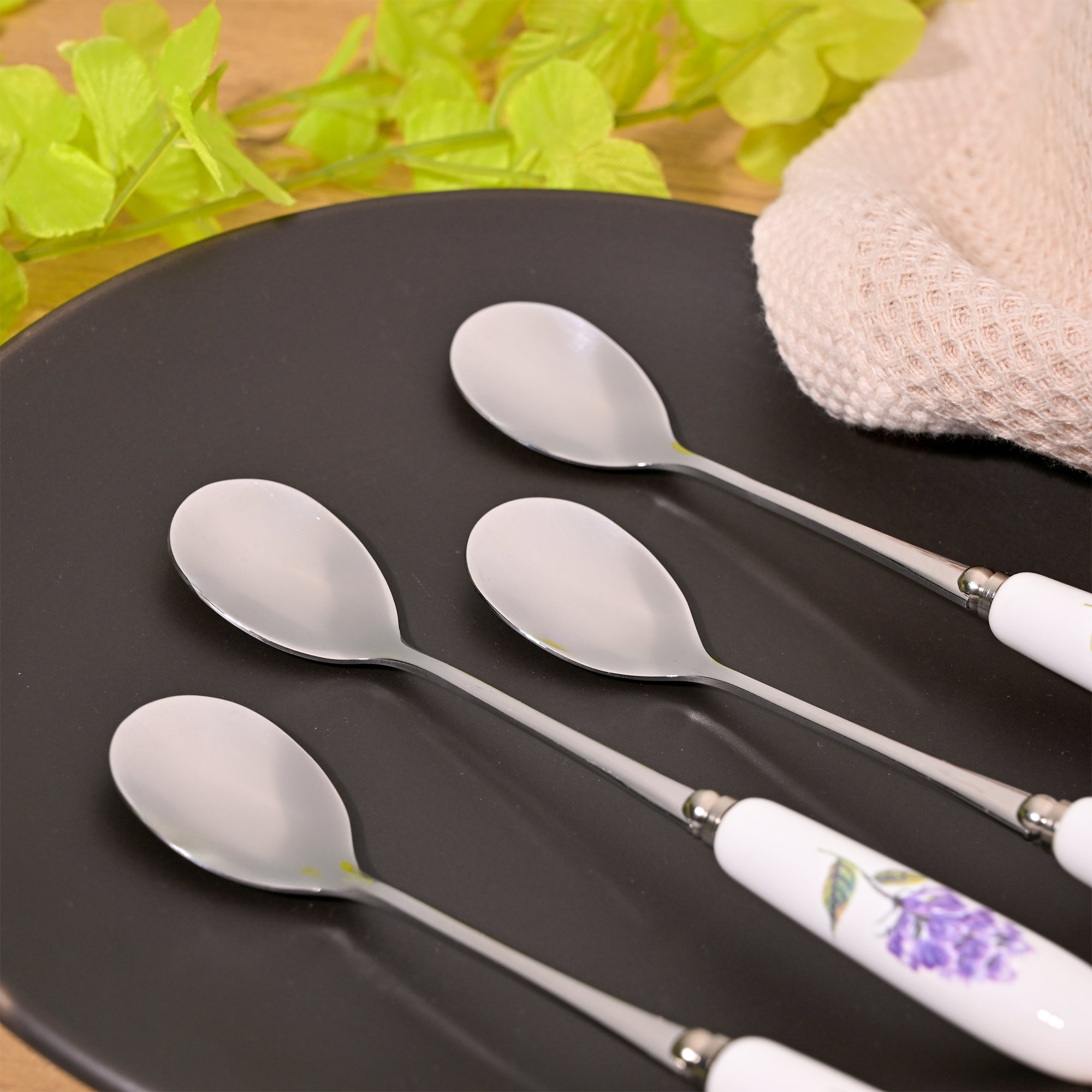 Set of four lavender dessert spoons

