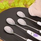 Set of four lavender dessert spoons

