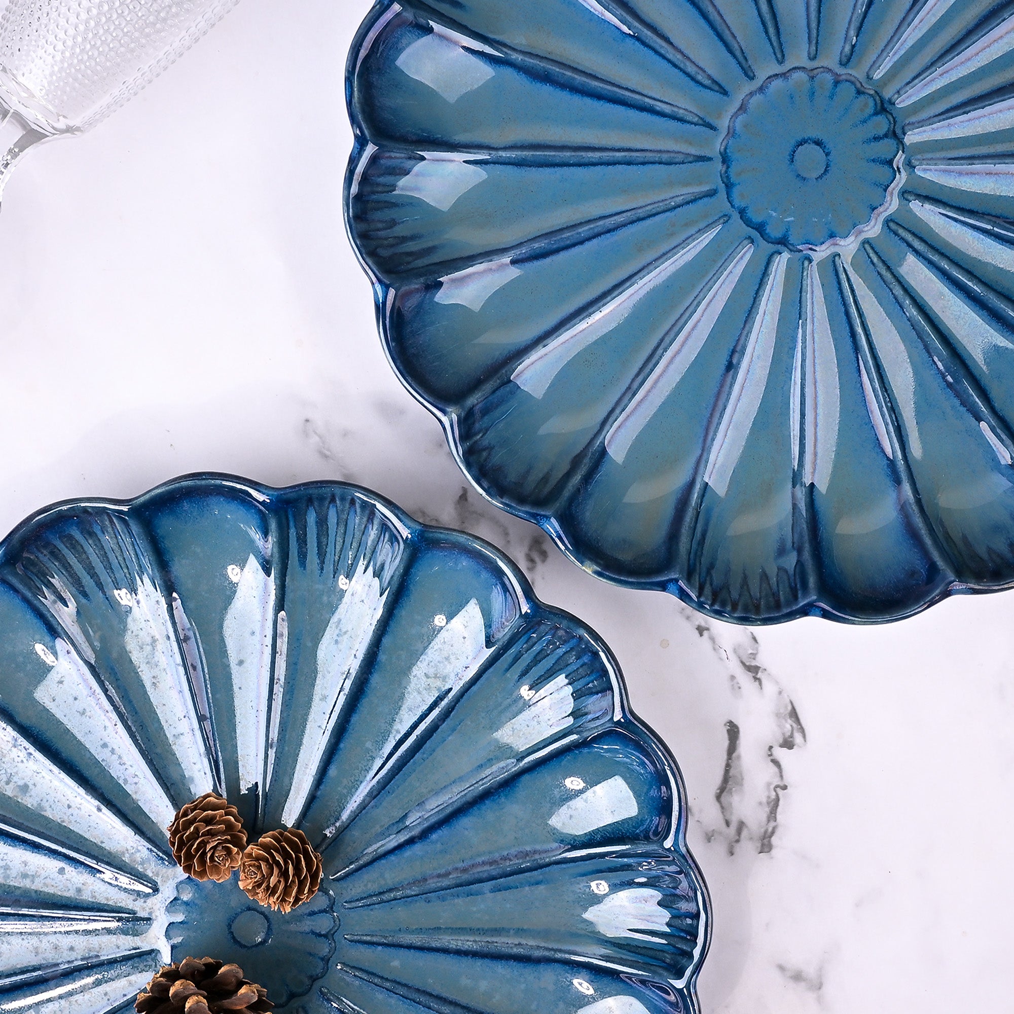 Set of 2 teal blue flower shaped ceramic plates

