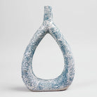 Elegant teal triangle vase featuring a textured finish

