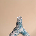 Modern textured teal vase for contemporary home decor

