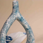 Sculptural triangle vase in a rich teal finish

