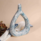 Teal textured flower vase for stylish interior decoration

