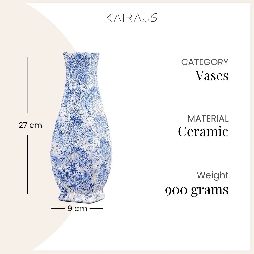 Blue flower vase with intricate surface detailing

