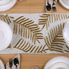 Handcrafted Thanksgiving table mat with gold and white beads
