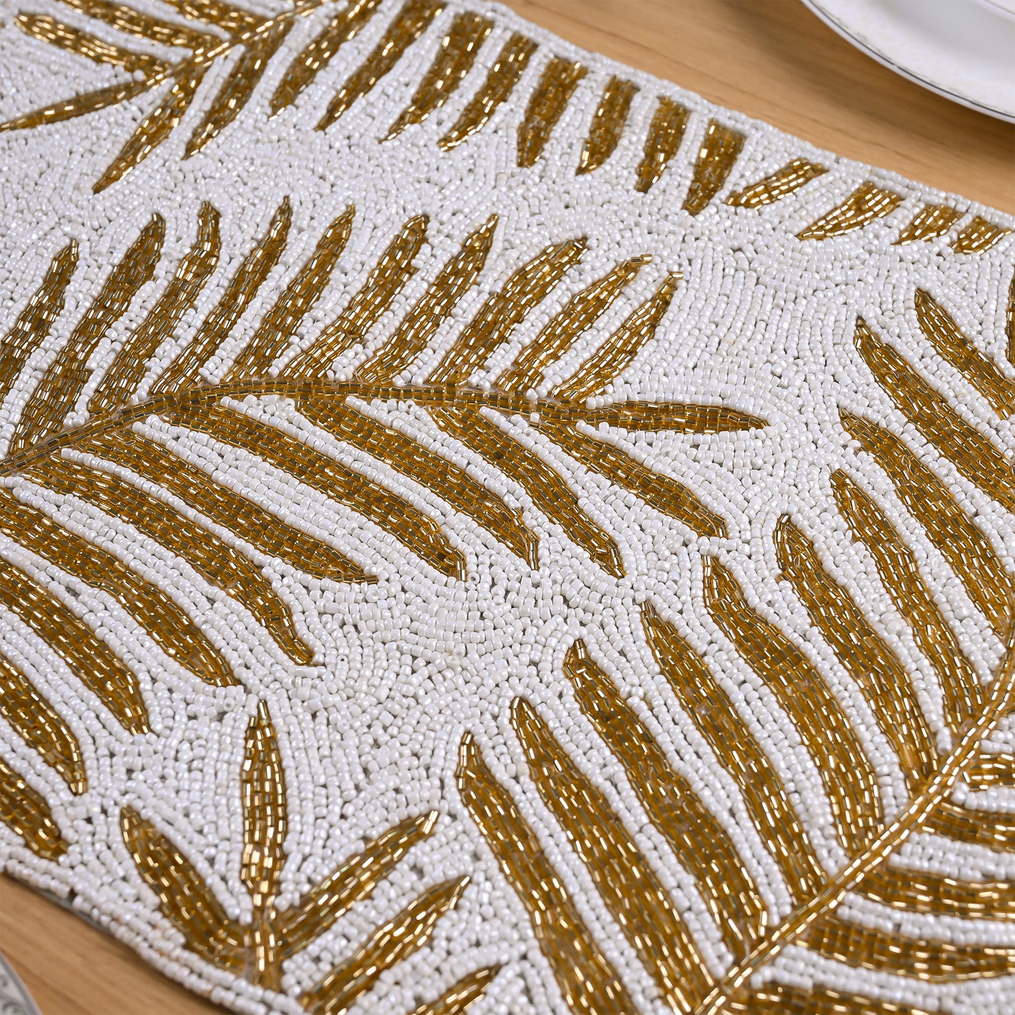 Elegant golden white table mat for festive dining
