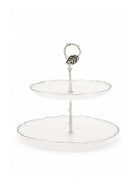 The Canopy Two-Tier Serving Stand displayed on a dining table