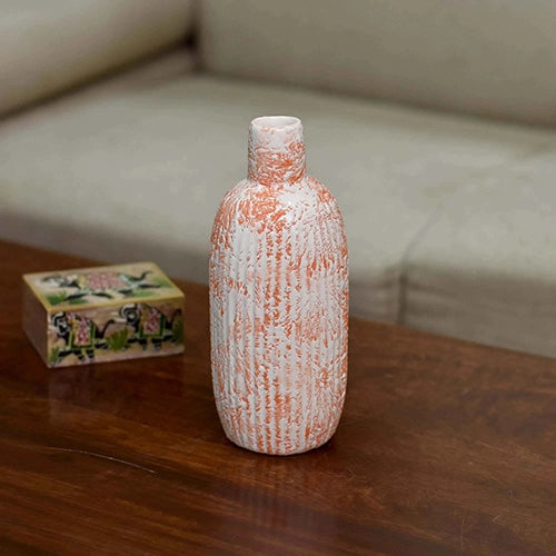 Decorative ceramic vase with coral and white artwork

