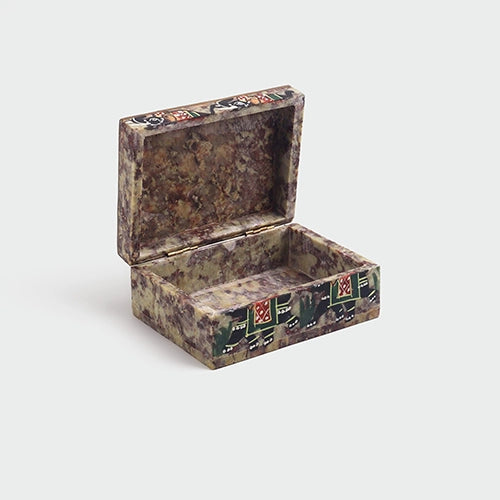 Elegant vintage marble jewelry box featuring elephant patterns

