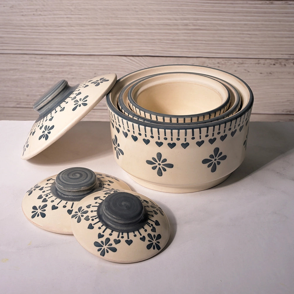 Grey and white ceramic serving bowls with lids

