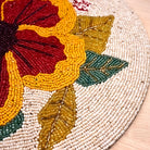 Elegant floral beadwork placemat for home decor
