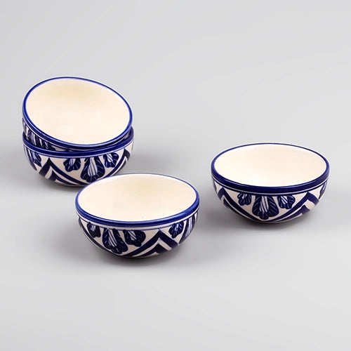 Set of four white and blue handcrafted bowls

