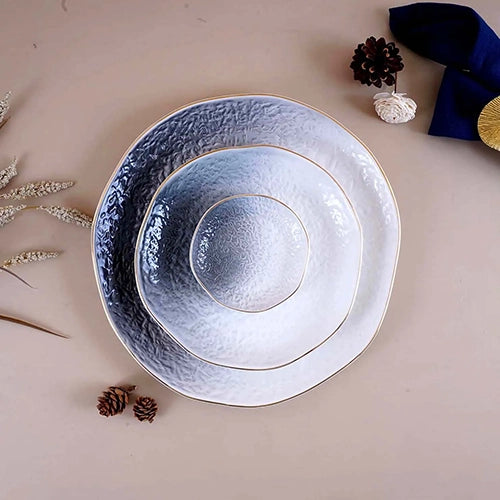 Set of 9 white and grey textured plates

