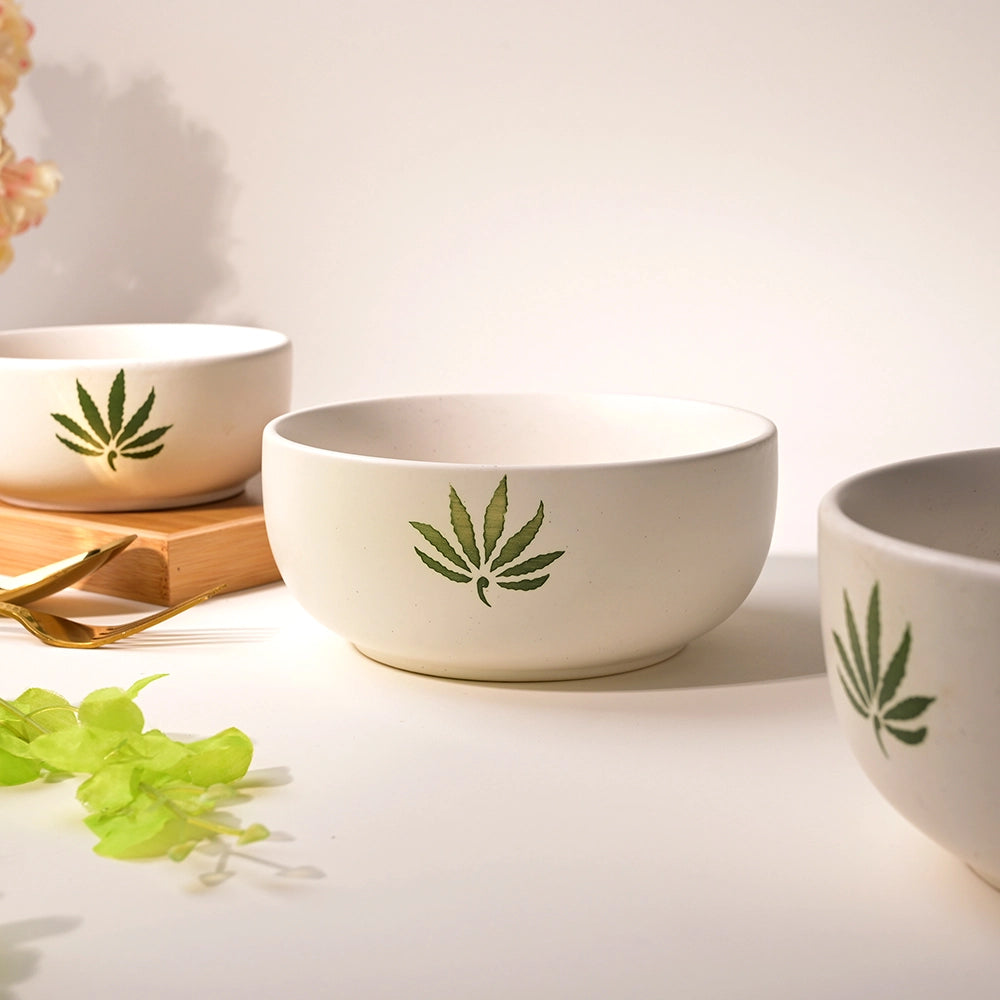Set of three white leaf print bowls

