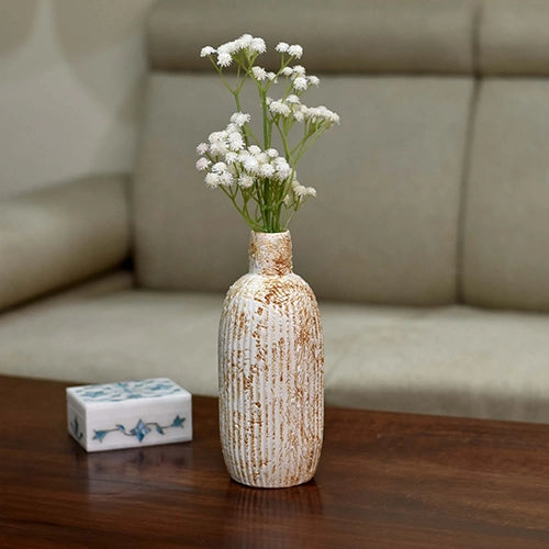 White patterned flower vase with intricate decorative design

