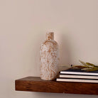Ornate white ceramic flower vase for interior decoration

